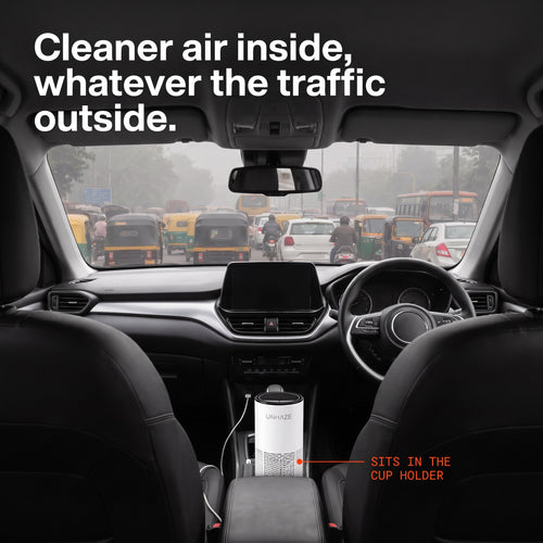 Unhaze C1 in a car cup holder in city traffic